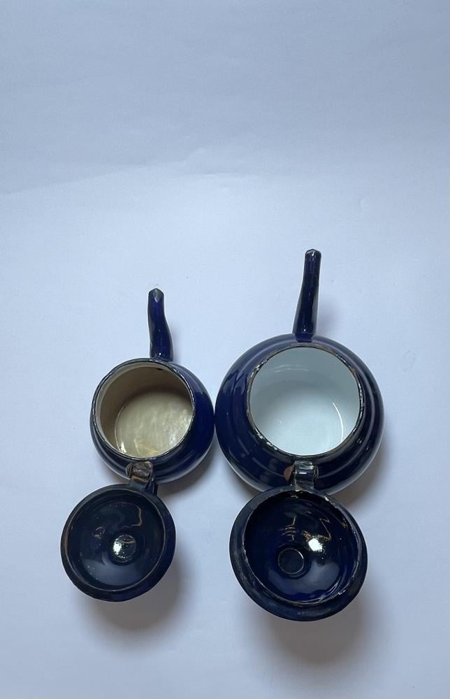طقم اباريق غضار ازرق