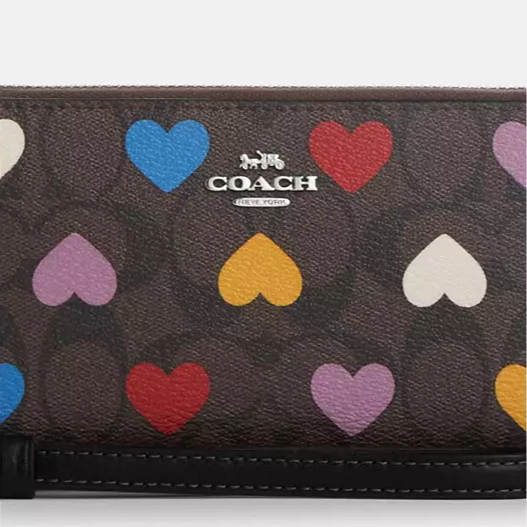 Women's sneakers with hearts print from Coach - مون اوتليت Moon