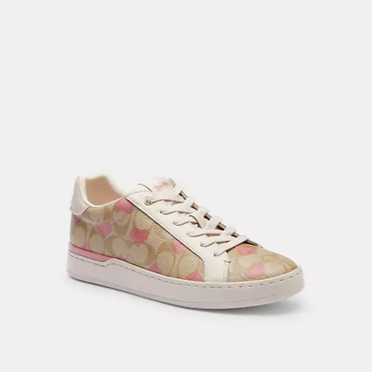 Women's sneakers with hearts print from Coach - مون اوتليت Moon
