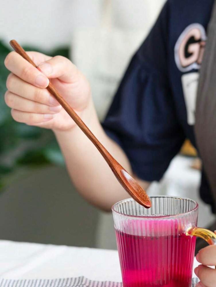 ملعقة خشبيه ( حبه واحدة )