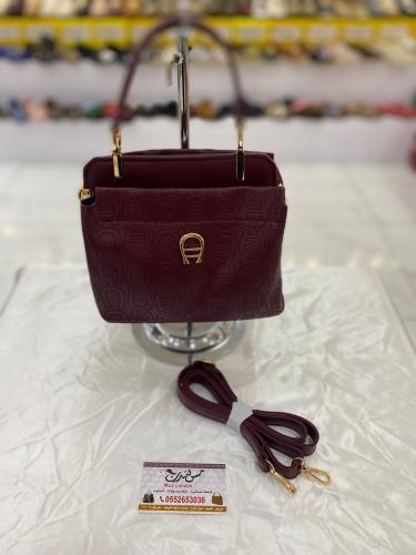 شنطة صغيرة عنابي 16950