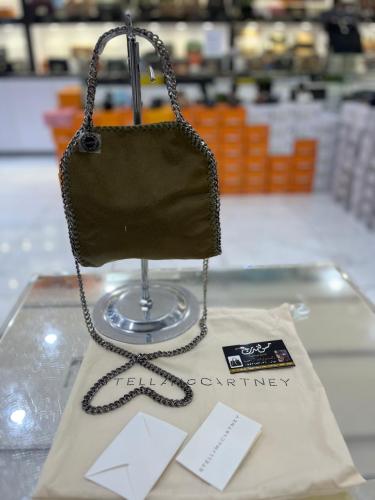 شنطة وسط زيتي موديل 1259