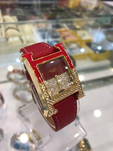 ساعة نسائية ذهبي /احمر 864