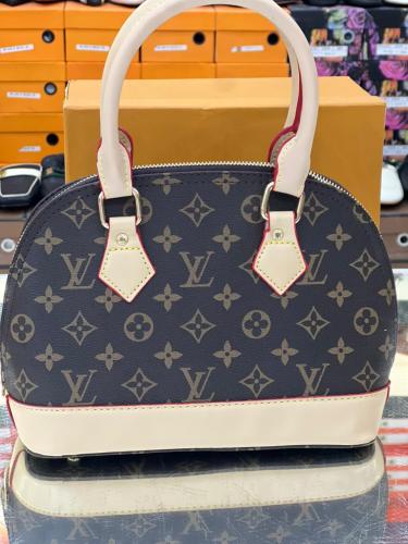 شنطة حجم وسط بني /بيج 6887