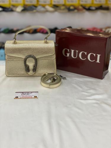 شنطة صغيرة ذهبي لامع 17043