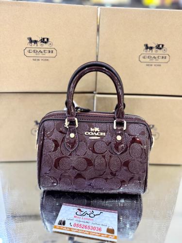 شنطة ميني بني غامق لامع 7026