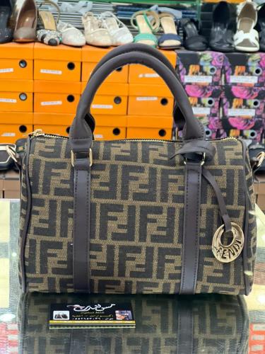 شنطة حجم وسط اخضر /بني 6899