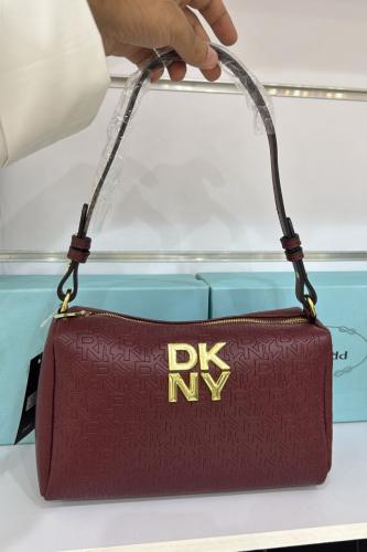 شنطة وسط عنابي 7011