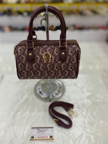 شنطة صغيرة عنابي 16946