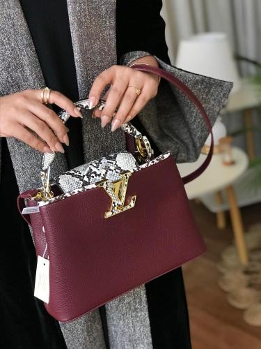 شنطة  وسط عنابي تايجر موديل 1678