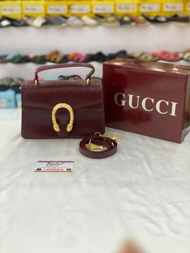 شنطة صغيرة عنابي لامع 17042