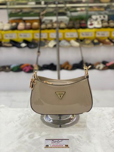 شنطة وسط  بيج فاتح لامع 16958