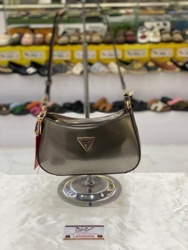 شنطة وسط  فضي لامع 16959