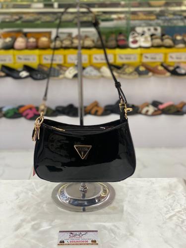 شنطة وسط اسود لامع 16957