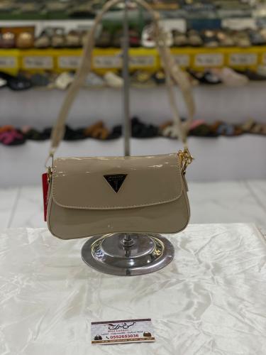 شنطة صغيرة بيج لامع 16953