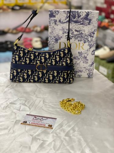 شنطة وسط كحلي /بيج 17018