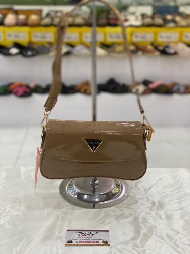 شنطة صغيرة بيج غامق لامع 16954