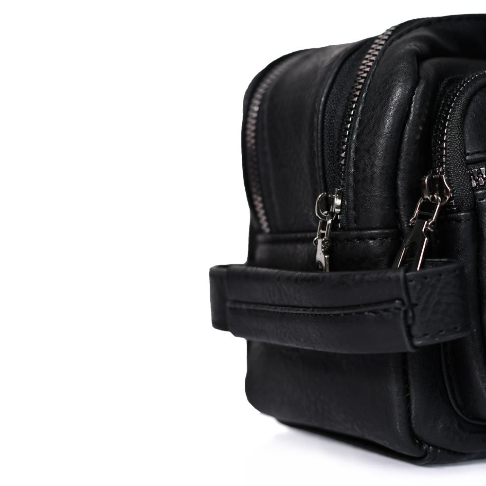 شنطة يد جلد بمقبض معصم مع فتحة داخلية للنقود والبطاقات و الاكسسورات أسود