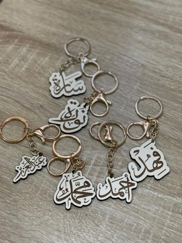 ميداليه خشب بالاسم