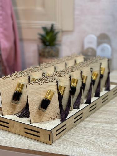 توزيعات توله العيد بكرت خشبي