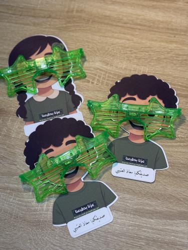 توزيعات اطفال لليوم الوطني١٢ حبه