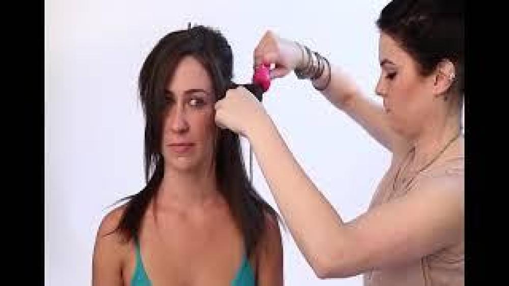 مكواة تجعيد الشعر