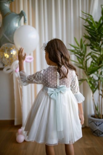 فستان مناسبات للبنات من الجبير الراقي مع تل منقط بفتحة من الظهر