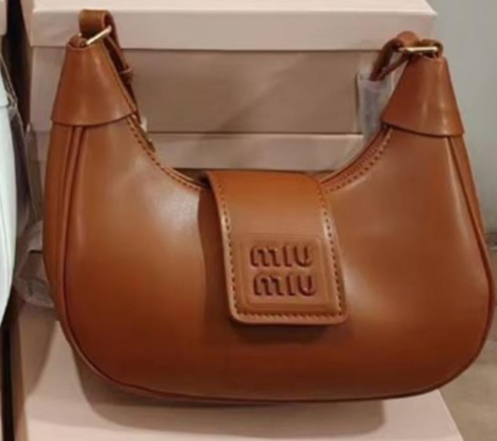 حقيبة يد ميو ميو لون جملي