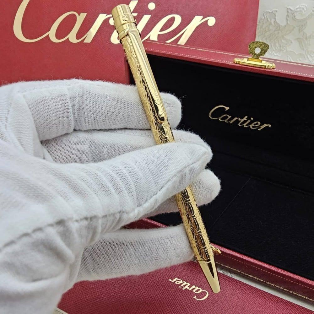 قلم كارتير سانتوس ذهبي منقوش