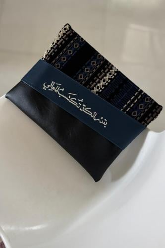 باوتش من الجلد الأسود وقماش السدو