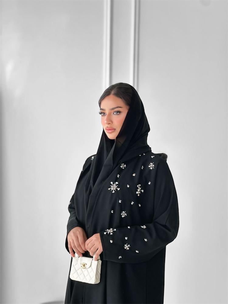 عبايات خروج سوداء شيك