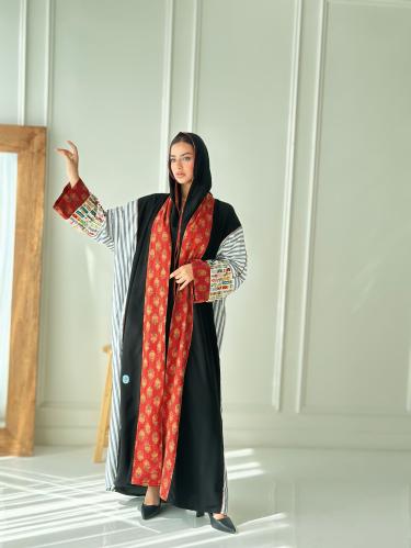 عباية مميزة بتدخيلات اقمشه مختلفه لتجعلها فريدة وت...