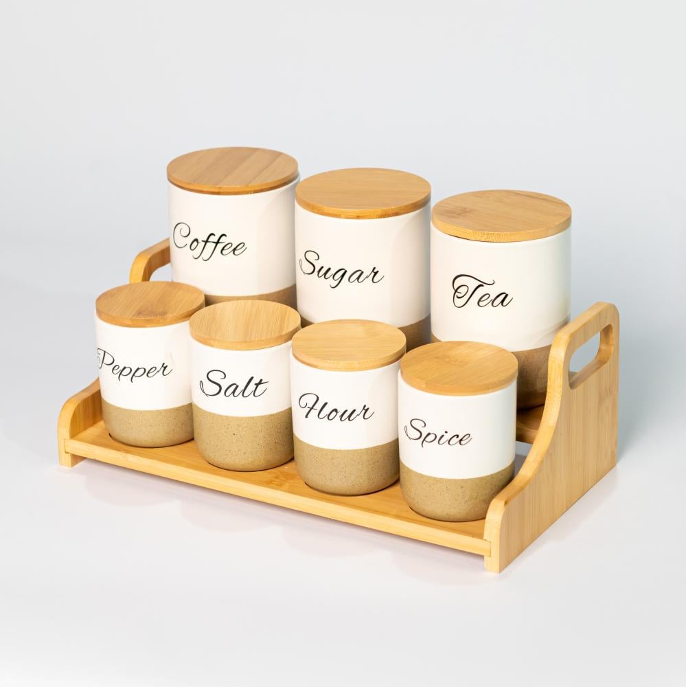 طقم علب بهارات 7 حبات بقاعدة خشبيه