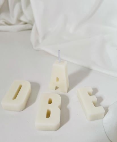 توزيعات شموع احرف