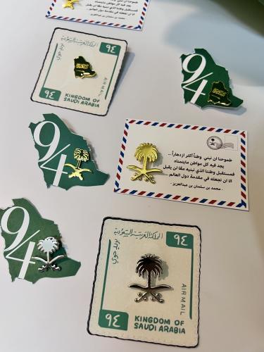 توزيعات بروش اليوم الوطني مع ثيم