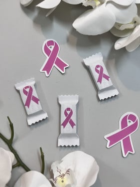 توزيعات ثيم اكتوبر الوردي مع علك