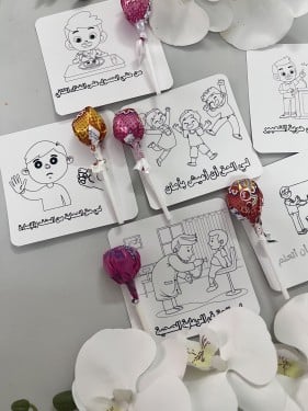 توزيعات ثيم  تلوين حقوق الطفل مع حلاوه مصاص