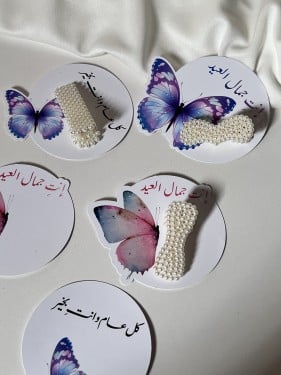 توزيعات ثيم العيد مع اكسسوار شعر