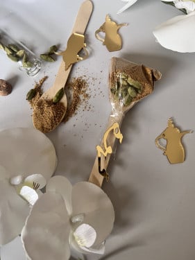 توزيعات يوم القهوة العالمي بالاسم