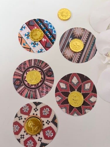 توزيعات شوكلاته ذهبية مع ثيم