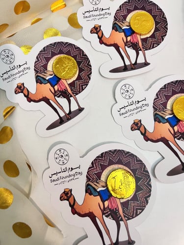 توزيعات جمل مع شوكلاته ذهبية