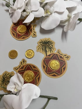 توزيعات ثيم نخلة مع شوكلاته ذهبية