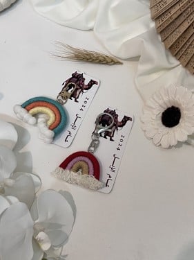 توزيعات ثيم عام الابل مع تعليقة قوس