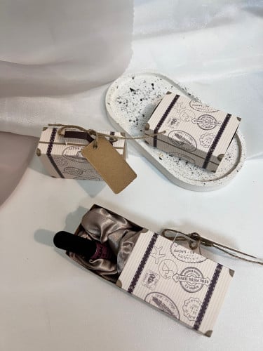 توزيعات  بوكس ثيم شنطه سفر