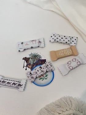 توزيعات ثيم مع شوكلاته او علك