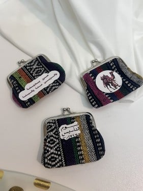 شنطة شعبية مع عبارة