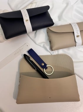 توزيعات عيد محفظه جلد