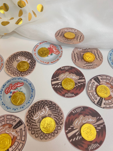 توزيعات ثيم خوص مع شوكلاته ذهبية