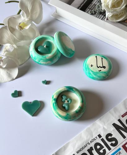 توزيعات شموع بالاسم