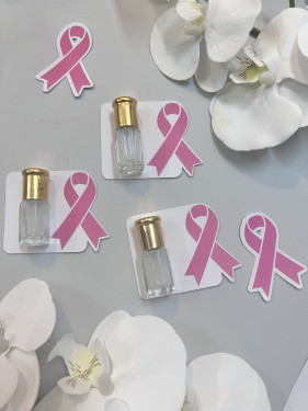 توزيعات تولة ثيم اكتوبر الوردي